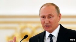 Russian President Vladimir Putin didn't say exactly what changes he wanted to make in world doping rules. (file photo)