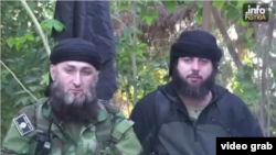 In the video, a man believed to be Akhmed Chatayev (right) appears alongside the notorious Islamic State militant Abu Jihad, a close confidante of the group's commander in Syria, Umar al-Shishani.