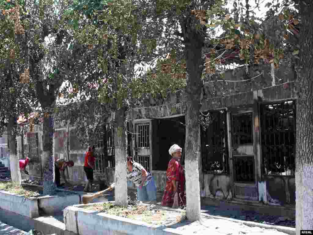 Burned-out stores in Osh city center